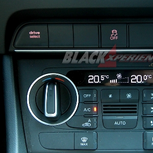 Tombol pengatur suhu dan fitur mode pengendaraan Audi Q3 