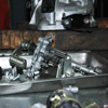 Rakit Mesin dan Transmisi Dog-Drive